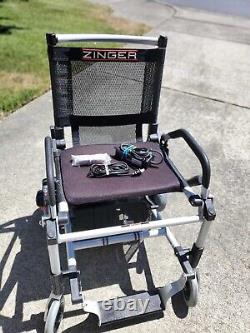 Chaise roulante pliante Zinger avec contrôle à deux mains